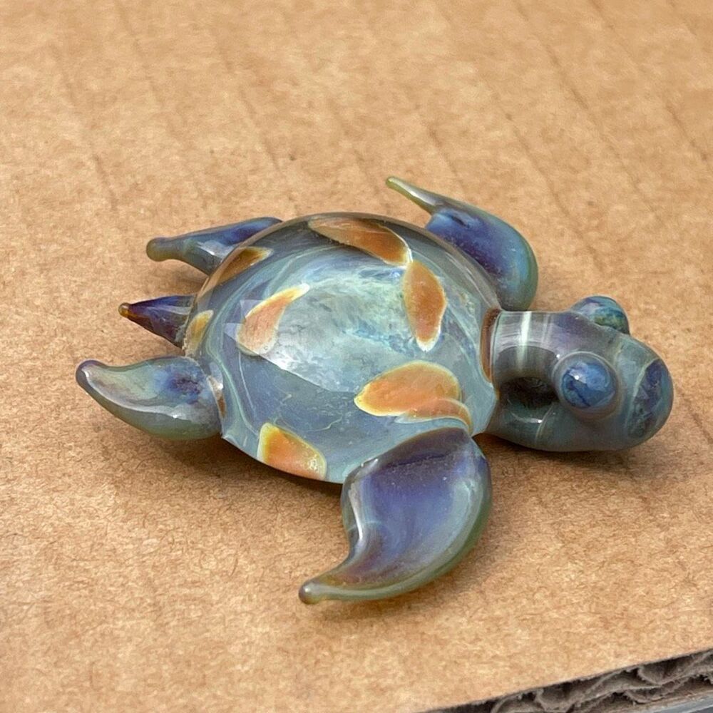 Handblown Artisan Sea Turtle glass pendant.